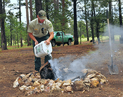 Firefighters prepared to report to the fireline.